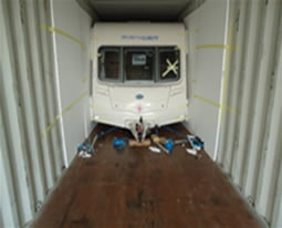 Caravan loaded securely on a 40ft high cube container